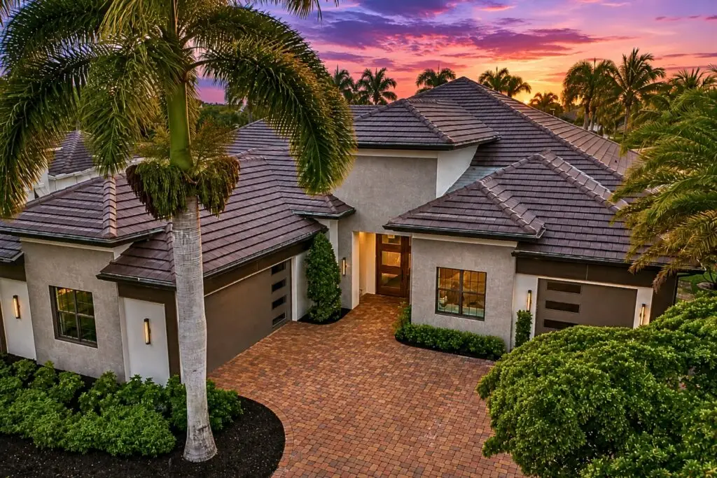 Miromar Lakes Drone Hero Shot of Stunning Home in Estero Florida with Beautiful Sunset - NV Construction 18x12
