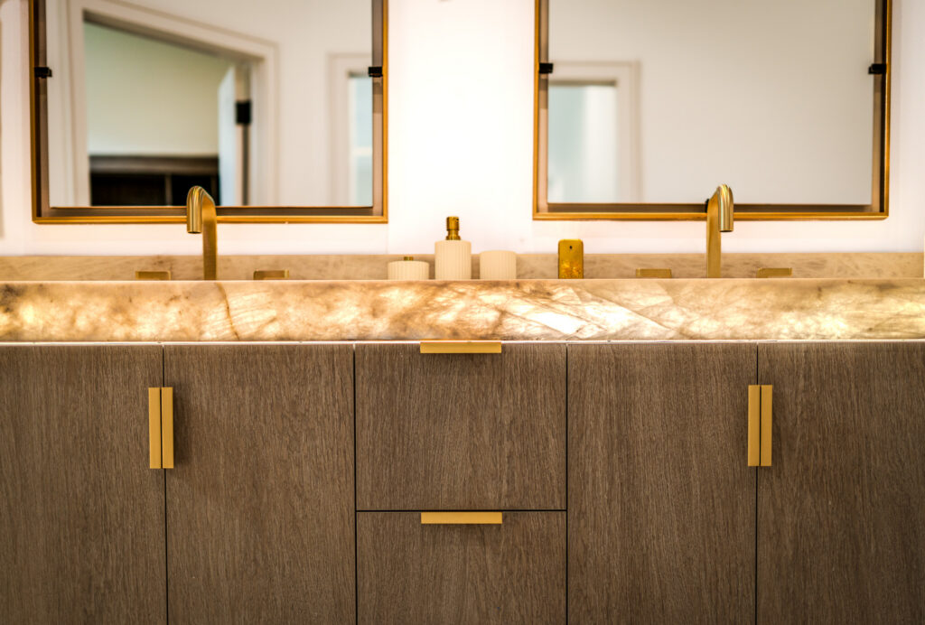 Stunning Primary His and Her Vanity Washroom with LED Lighting Under Marble Countertops - NV Construction